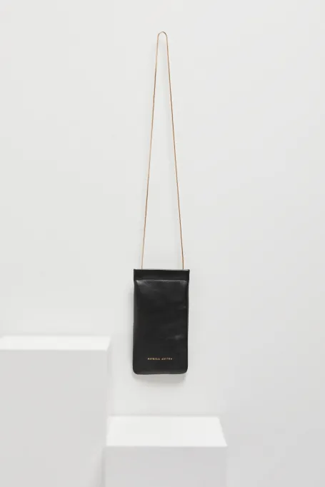 Schwarzes Lederetui für Brille, Telefon