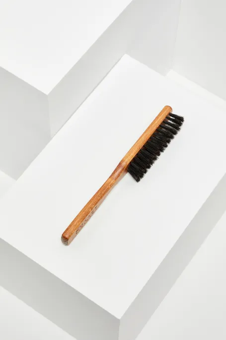 Bürste zur Kleidungs- und Stoffpflege muster