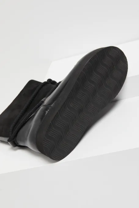 Schwarze Leder-Winterschuhe