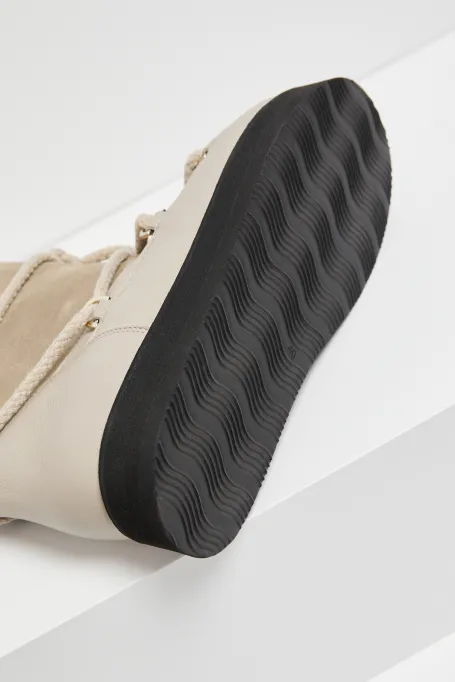 Beige Lederschneeschuhe