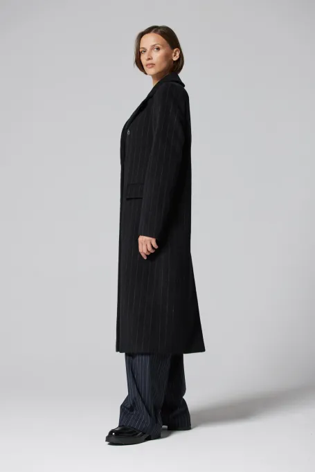 Wollmantel im Tennis-Design