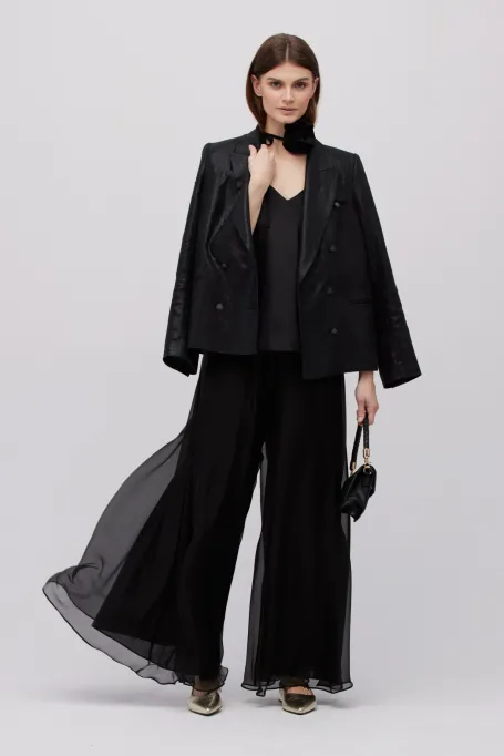 Schwarze weite Seidenhose