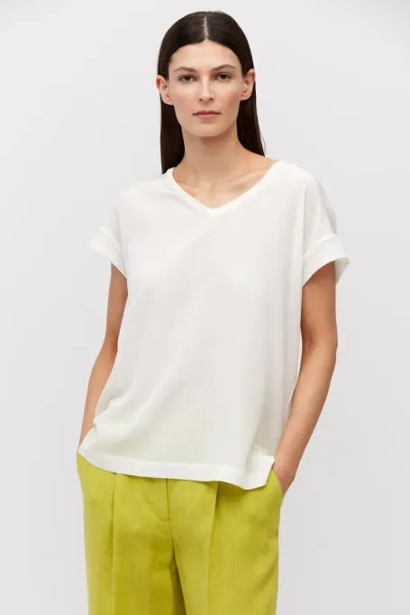 Weiße Strickbluse mit Seide