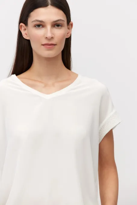 Weiße Strickbluse mit Seide