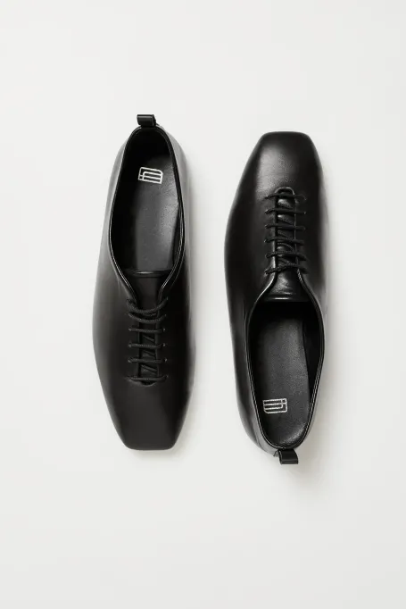 Weiche geschnürte Ballerinas