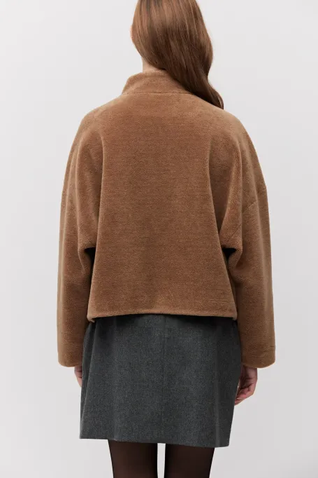 Jacke aus Teddybärwolle mit Lederverschluss