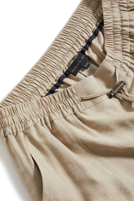 Beige weite Hose mit Wollanteil